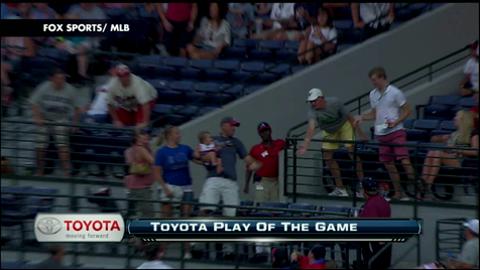 GIF: Fan Catches Home Run Bare-Handed While Holding a Baby