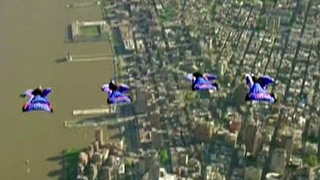 Wingsuit daredevils soar over Manhattan skyline