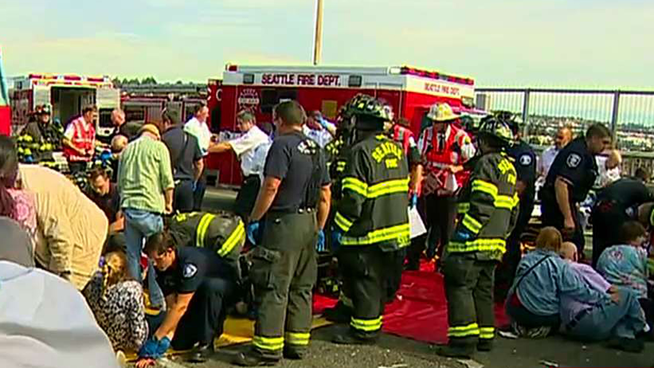 Injuries reported after duck boat plows into charter bus