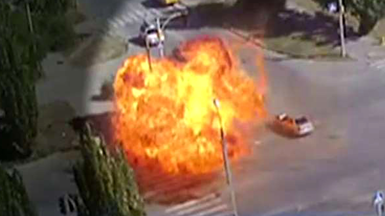 Massive fireball fills intersection after vehicles collide