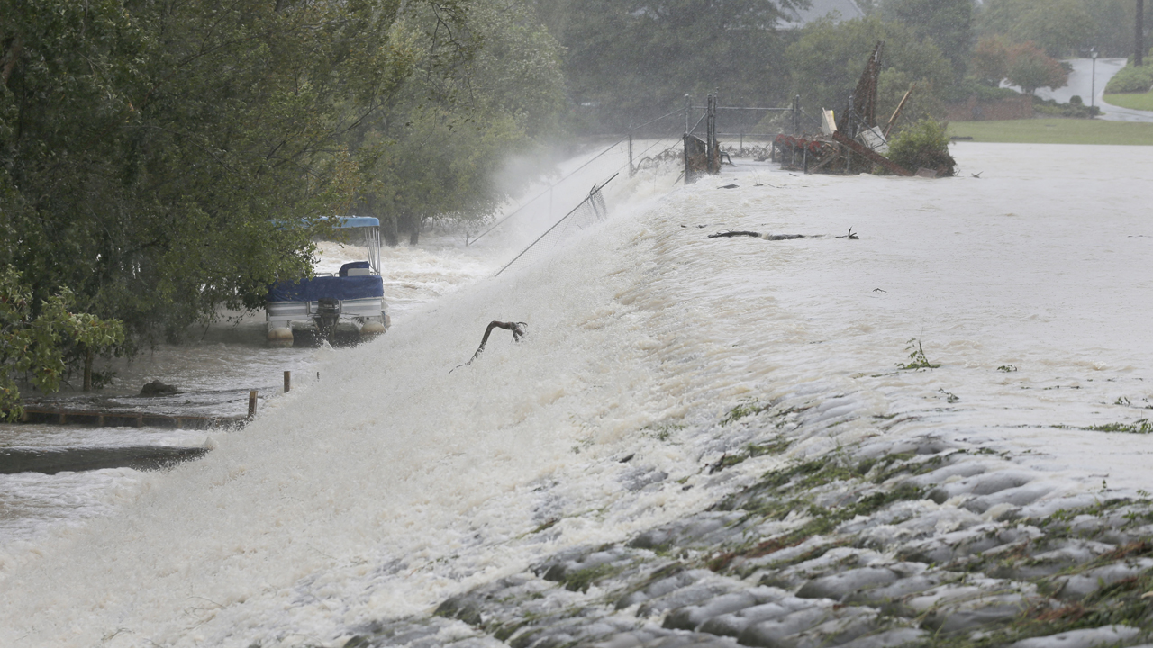 Flood waters breach dams in South Carolina