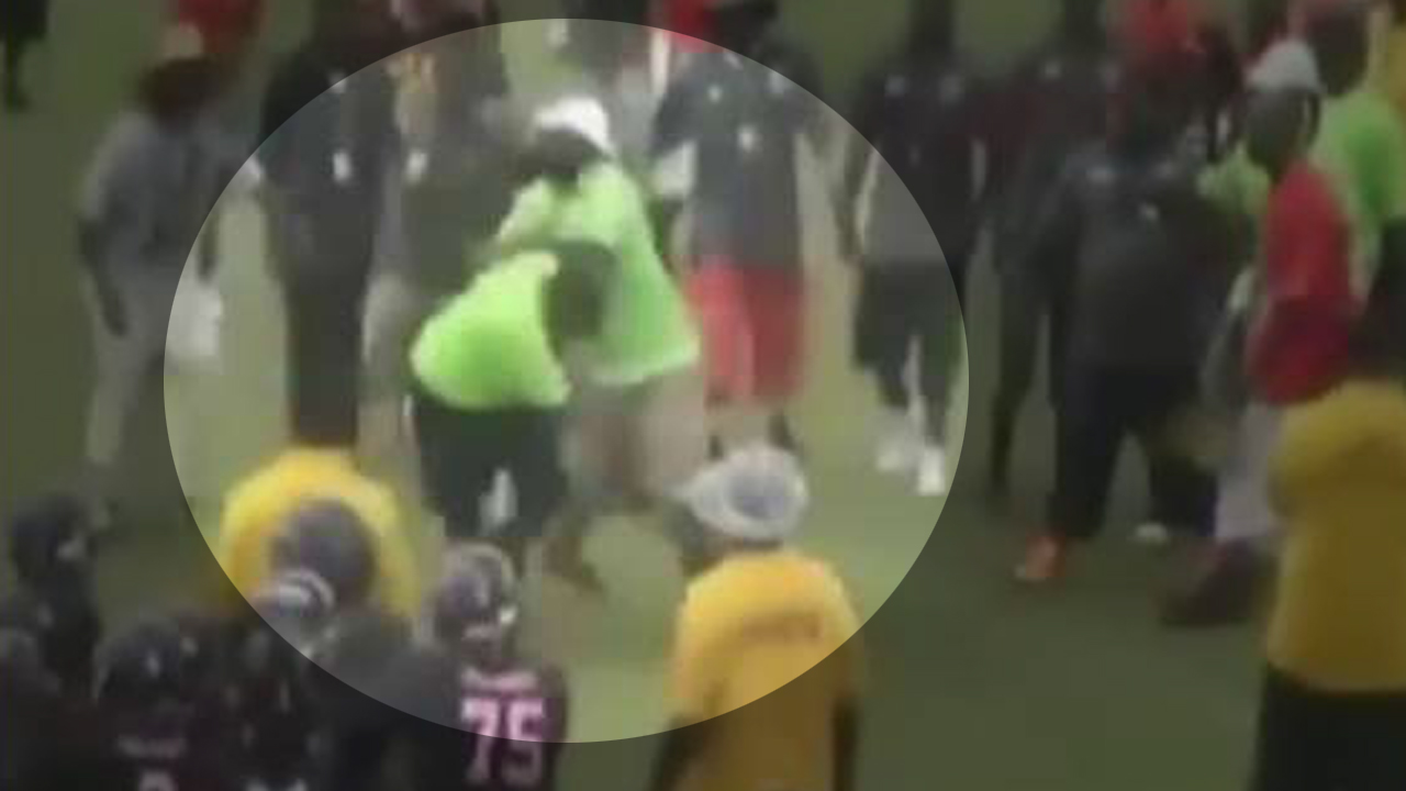 Football coach charges, punches ref in face