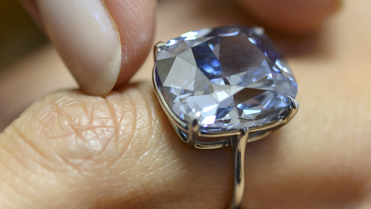 Rare 'Blue Moon' diamond sells for record $48.5 million