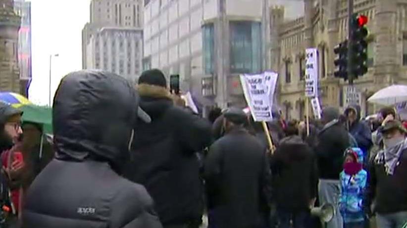 Protesters swarm Chicago's shopping district on Black Friday