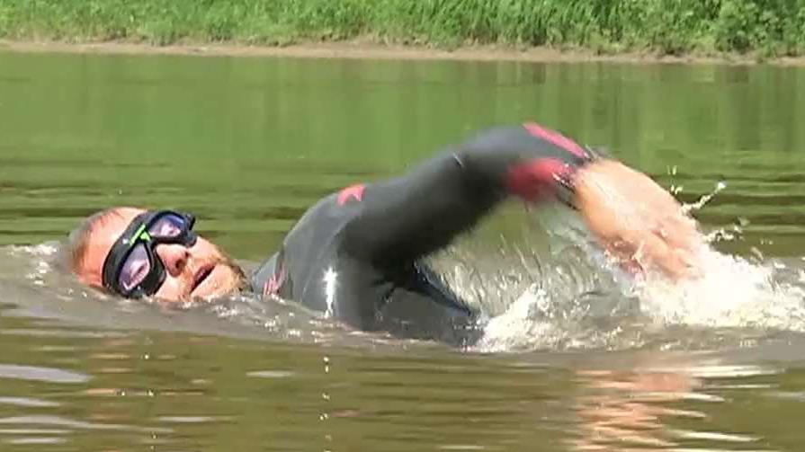 Navy vet finishes historic swim in memory of fallen heroes