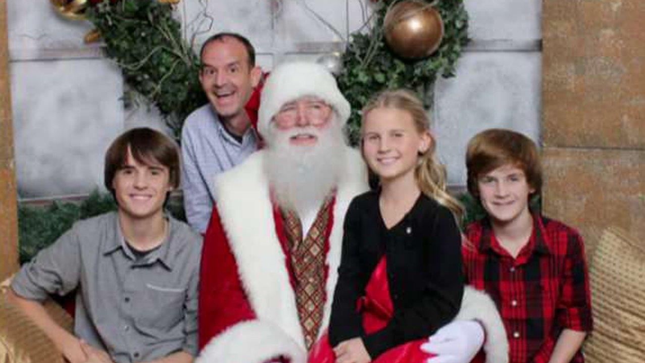 Deployed dad surprises kids by photobombing Santa picture