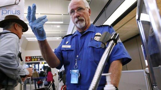 Holiday travelers face new airport security measures