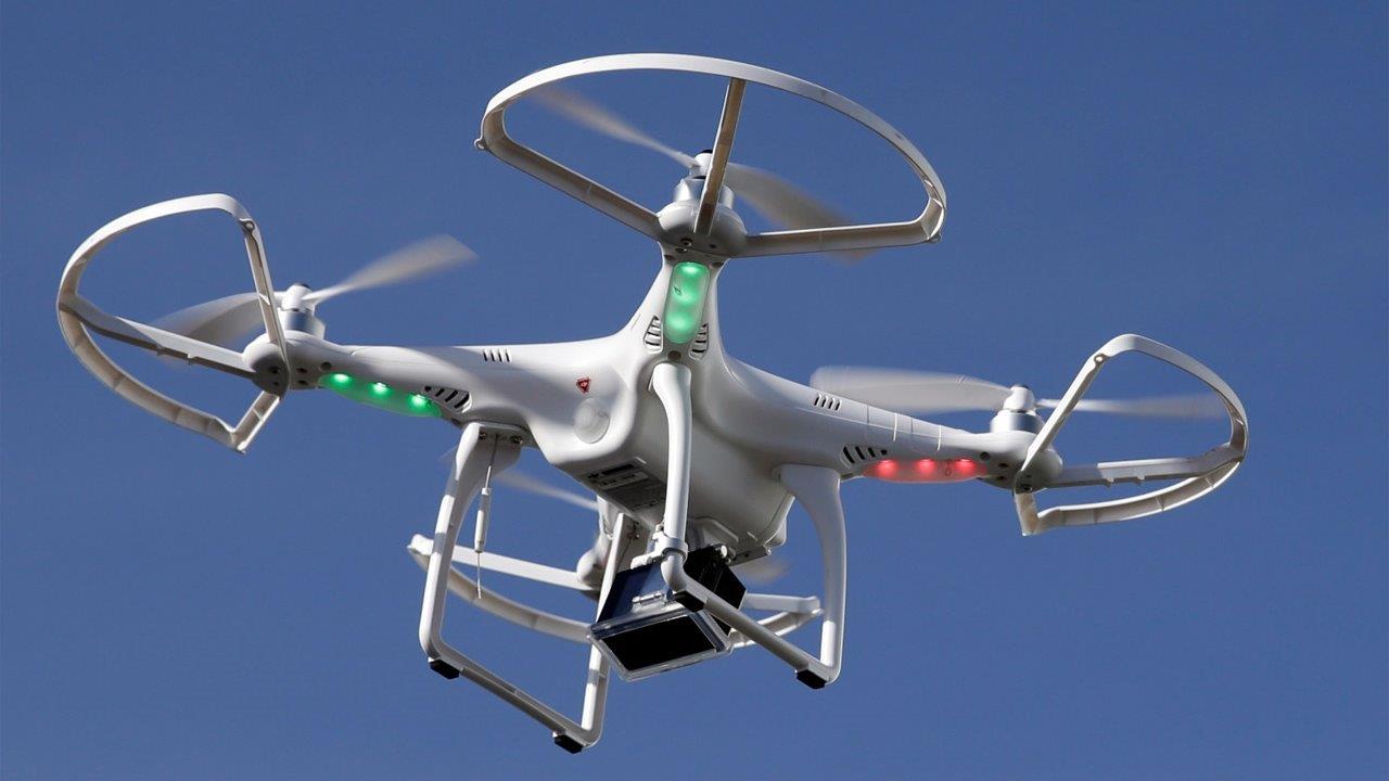 Personal drone flies alongside Obama's motorcade in Hawaii
