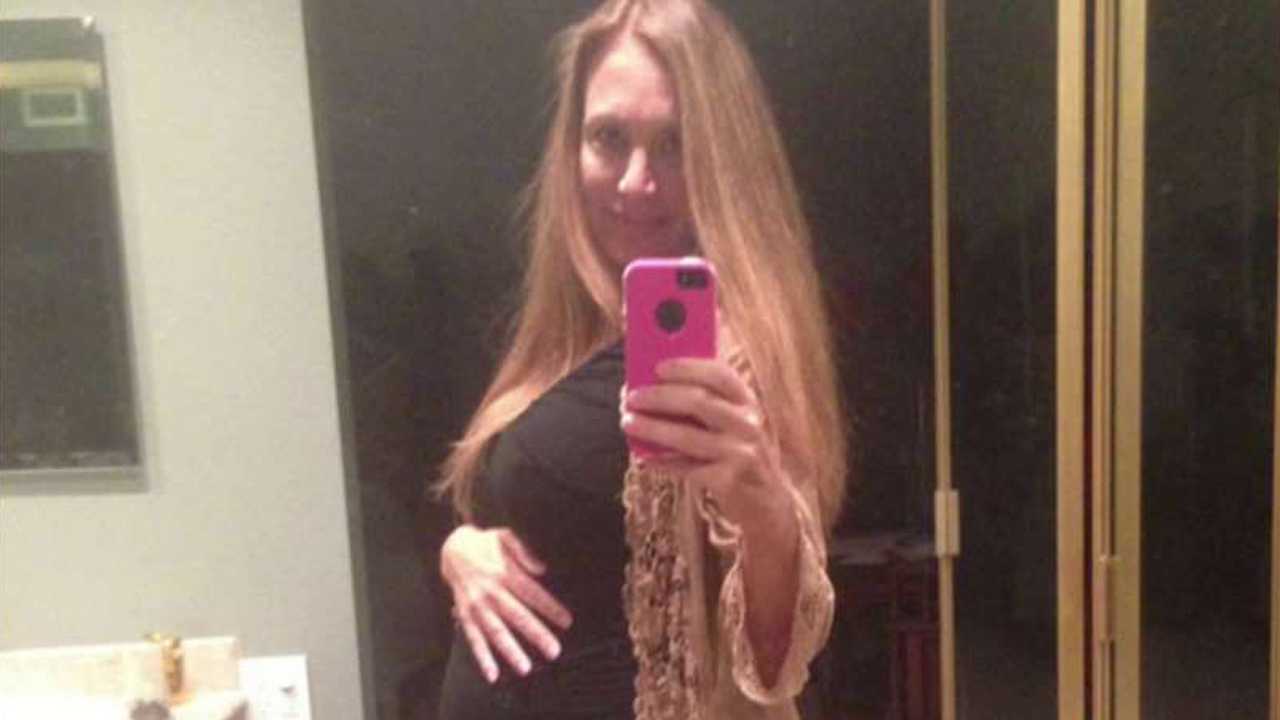 Surrogate mother carrying triplets sues to stop abortion