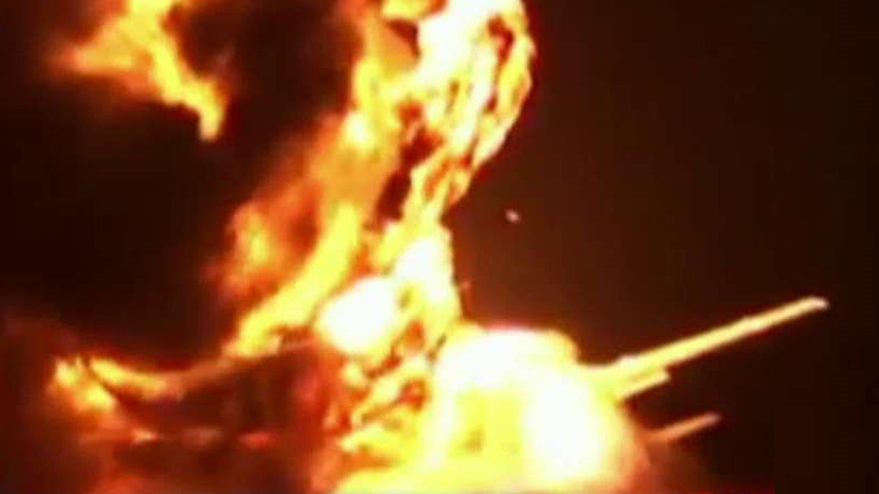 Russian bomber jet bursts into flames during takeoff