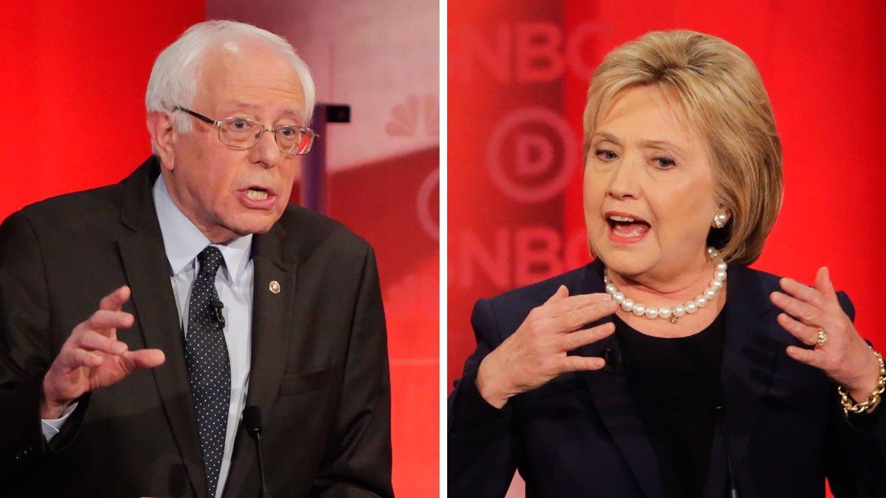 Bought and paid for? Clinton accuses Sanders of smears