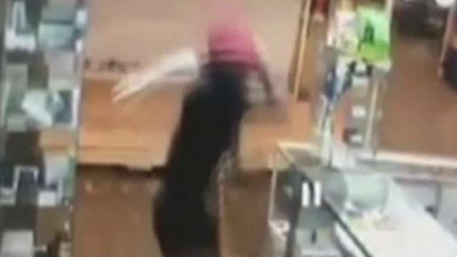 Video: Man attacks store clerk with sword