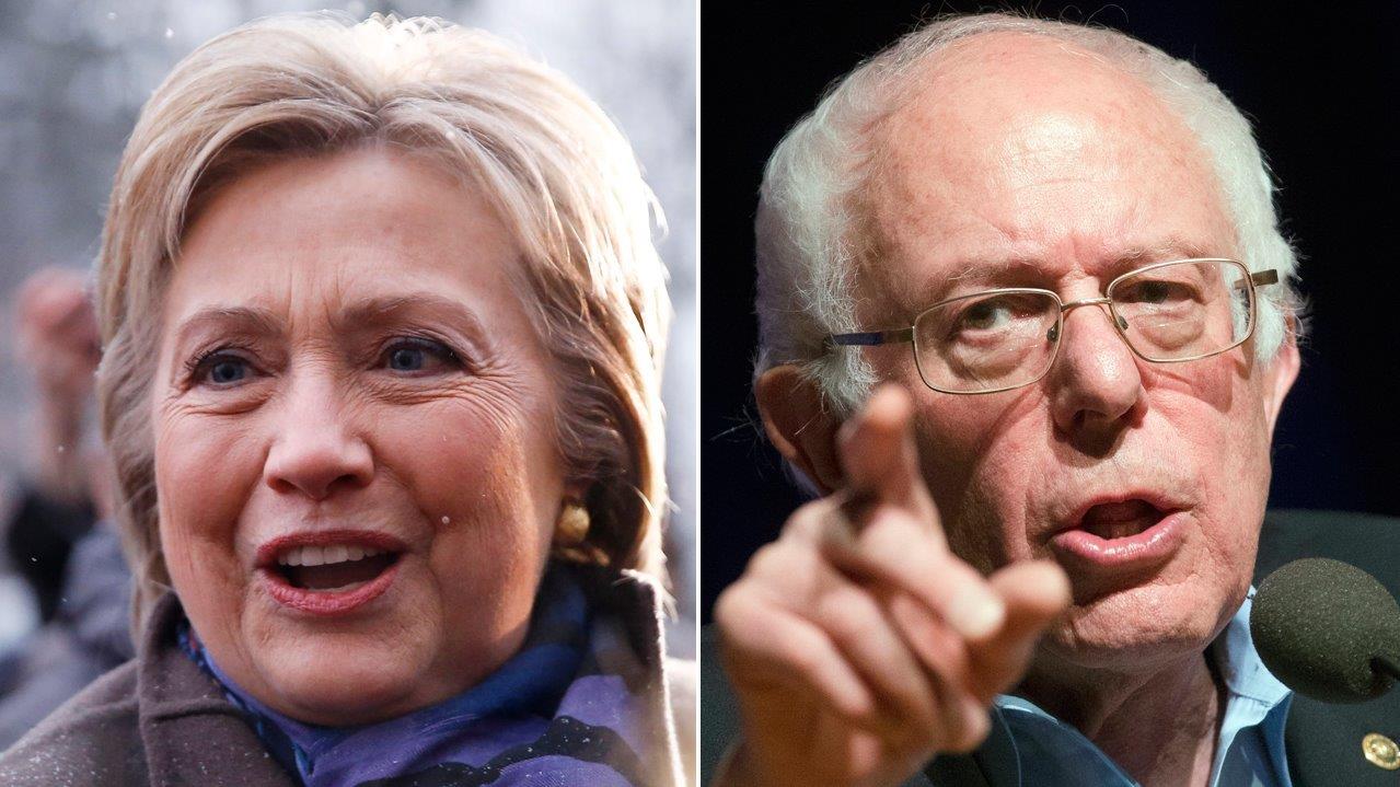 Clinton, Sanders make final push for votes on NH primary day