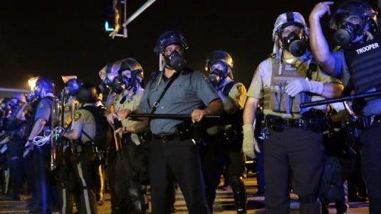 Ferguson's mayor fights back against costly police reforms