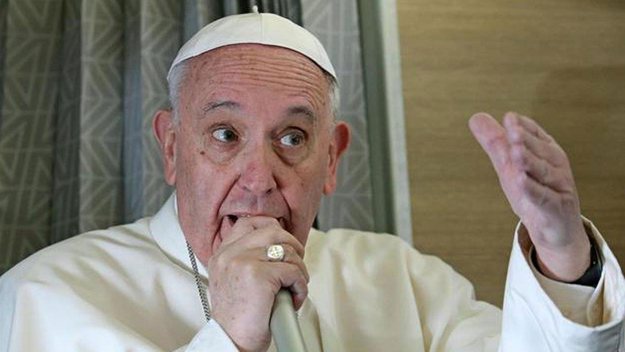 Pope Francis criticizing Donald Trump