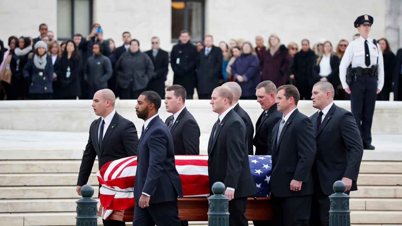 Justices gather as Scalia's casket arrives at Supreme Court