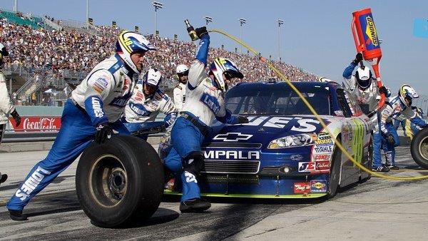 On pit road: NASCAR tire-changing race 