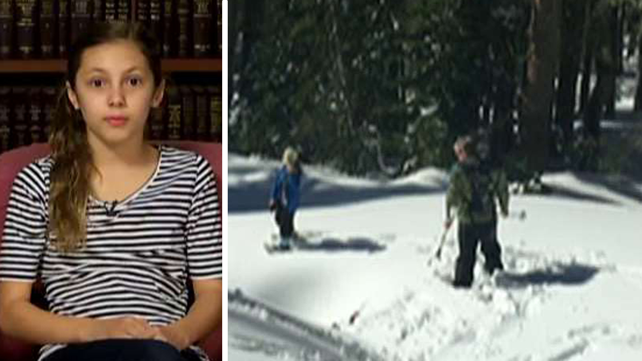 Search-and-rescue team saves girl who fell into snow hole
