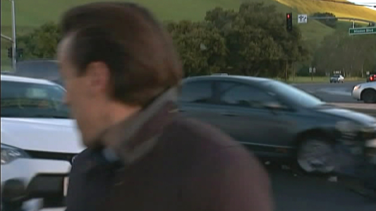 WATCH: Car nearly crash into reporter during live report
