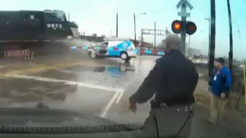Officer saves man from oncoming train with seconds to spare