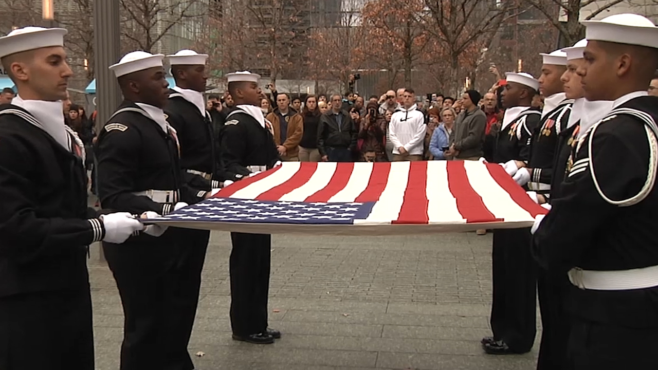 U.S. Navy Ceremonial Guard presents flag to 9/11 Memorial