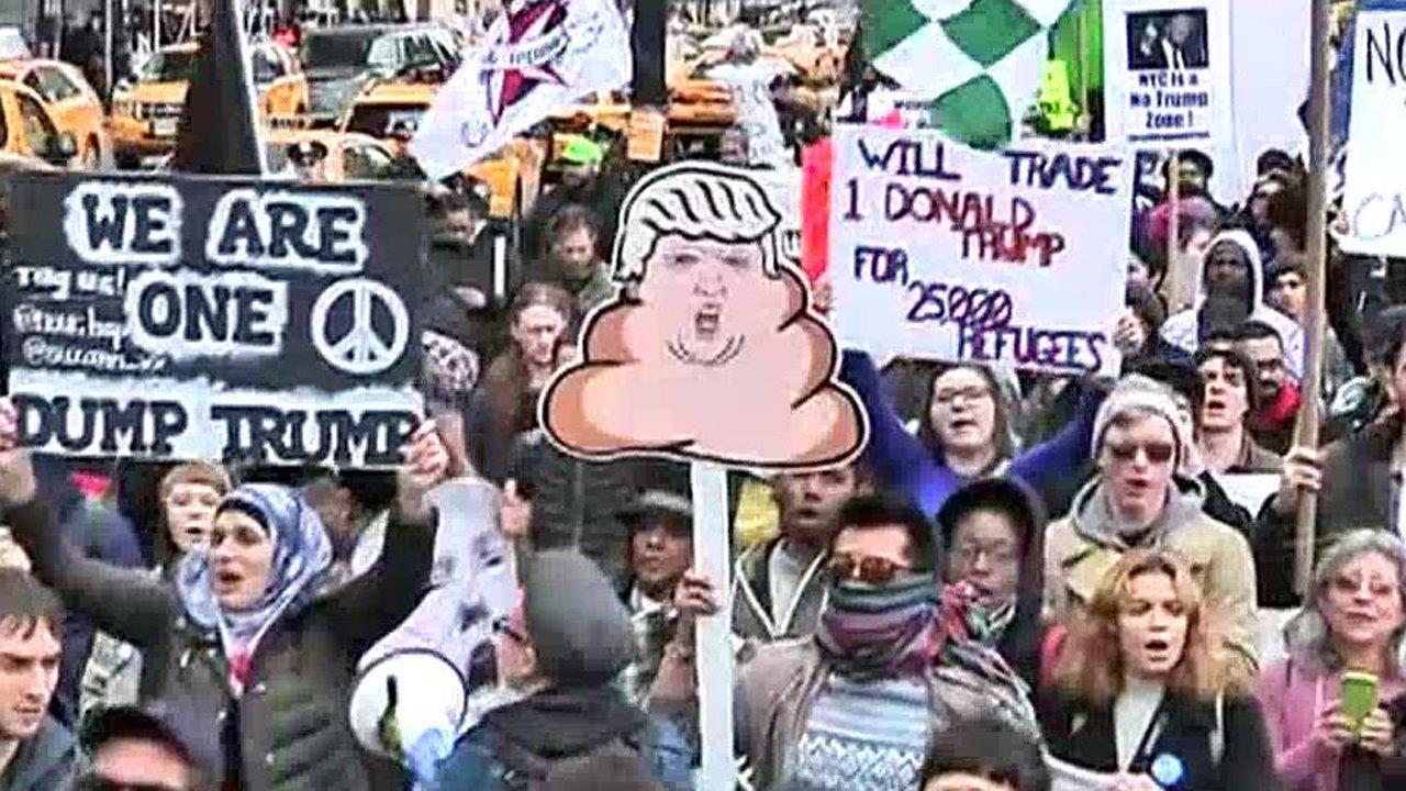 Hundreds of protesters march to Trump Tower in NYC