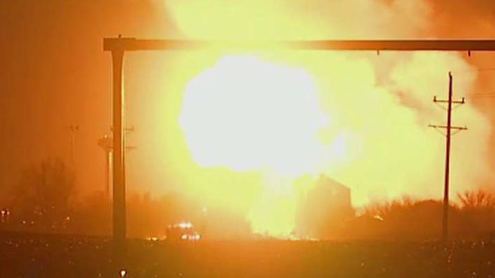 Fiery blast after train hits propane truck