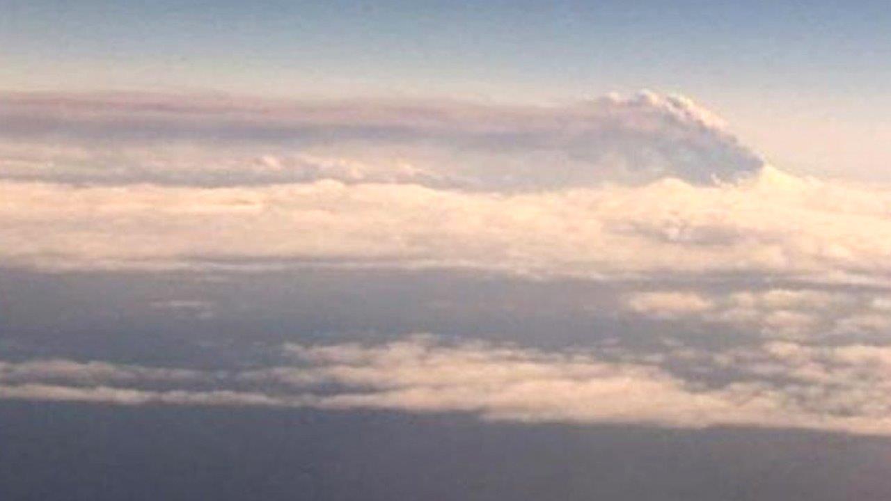 Erupting Alaskan volcano spews ash 20,000 feet into the air