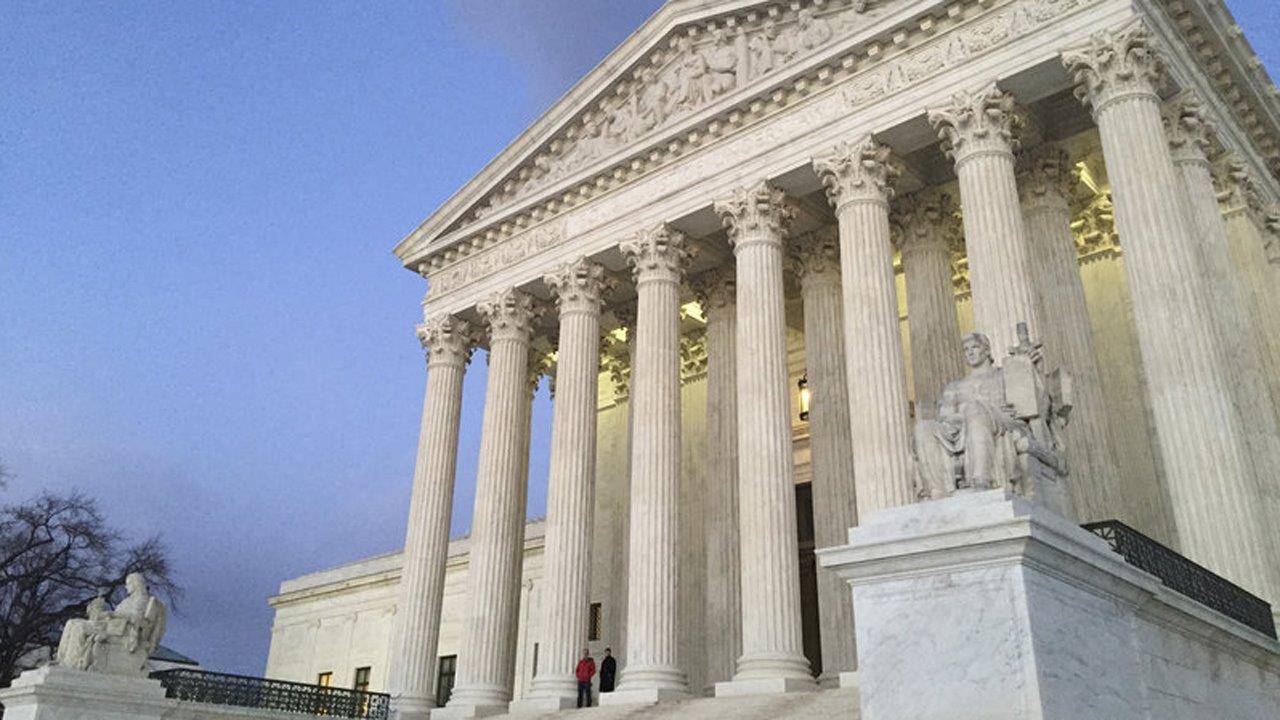 Split US Supreme Court rejects challenge to union fees