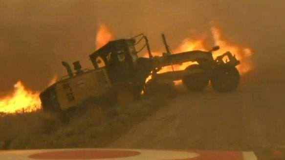 TV news crew helps driver narrowly escape from wildfire