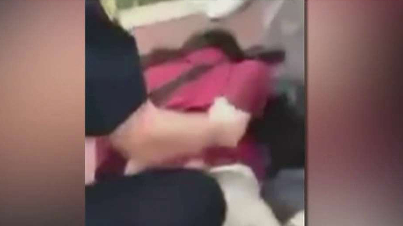 Shocking video shows cop throwing girl to ground