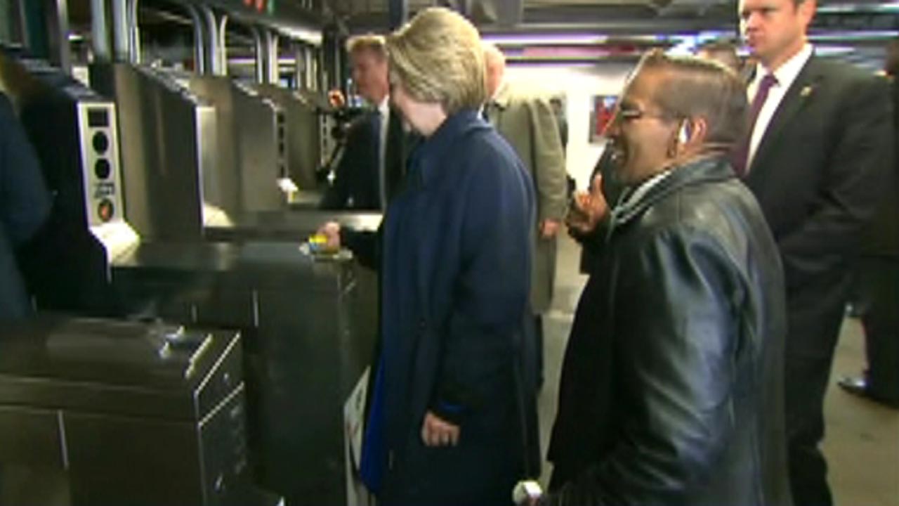 Hillary Clinton struggles with her Metrocard in NYC subway