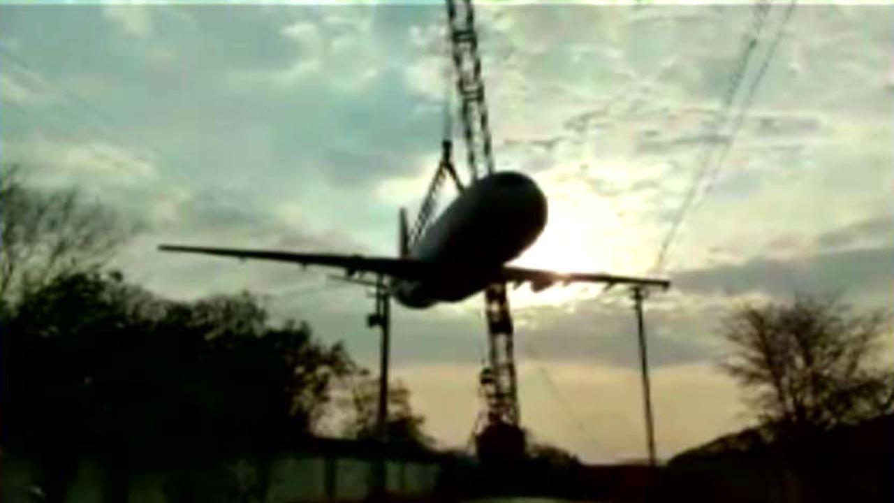 Crane collapse sends passenger jet crashing to the ground