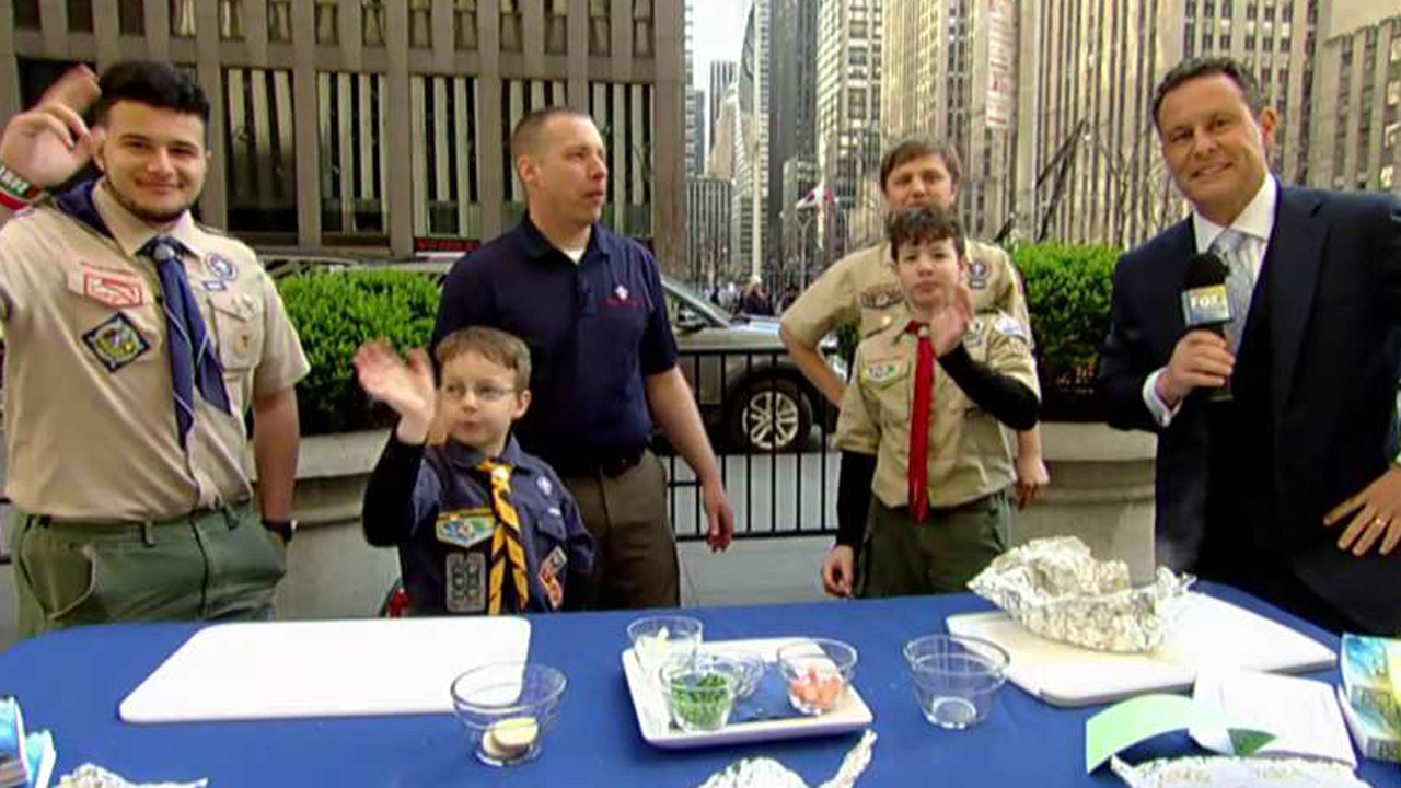 Boy Scouts demonstrate foil cooking techniques