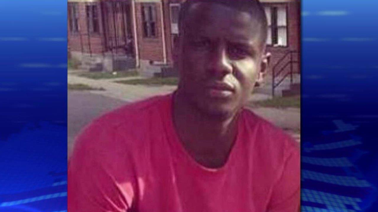 Peaceful march held one year after death of Freddie Gray