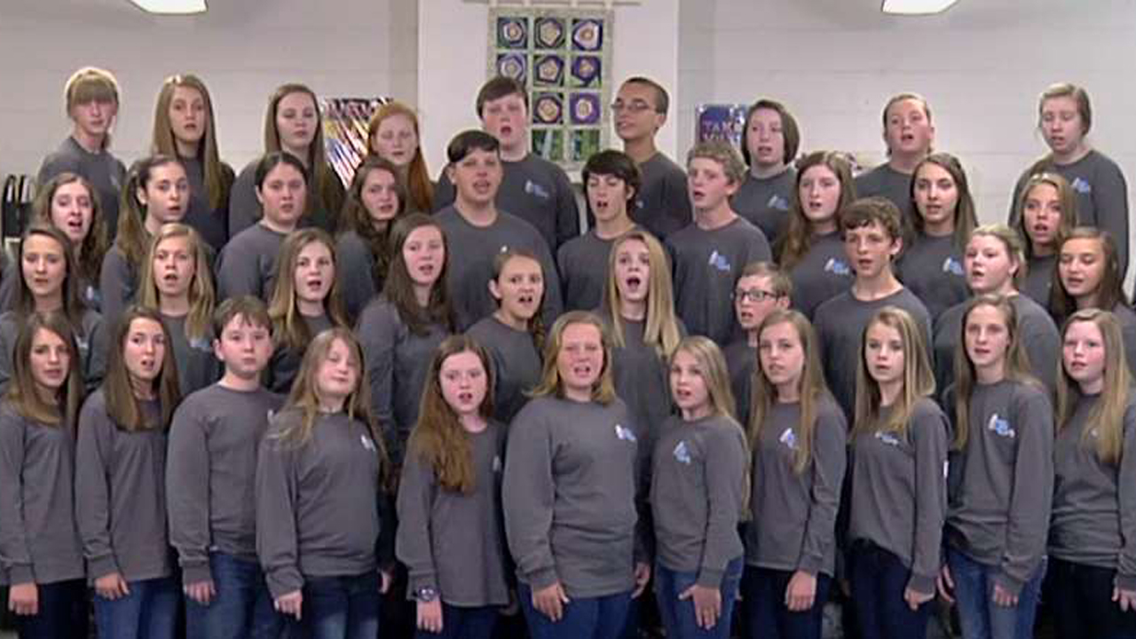 Students singing national anthem at 9/11 Memorial silenced