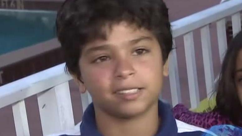 Hero 11-year-old saves teen drowning in pool