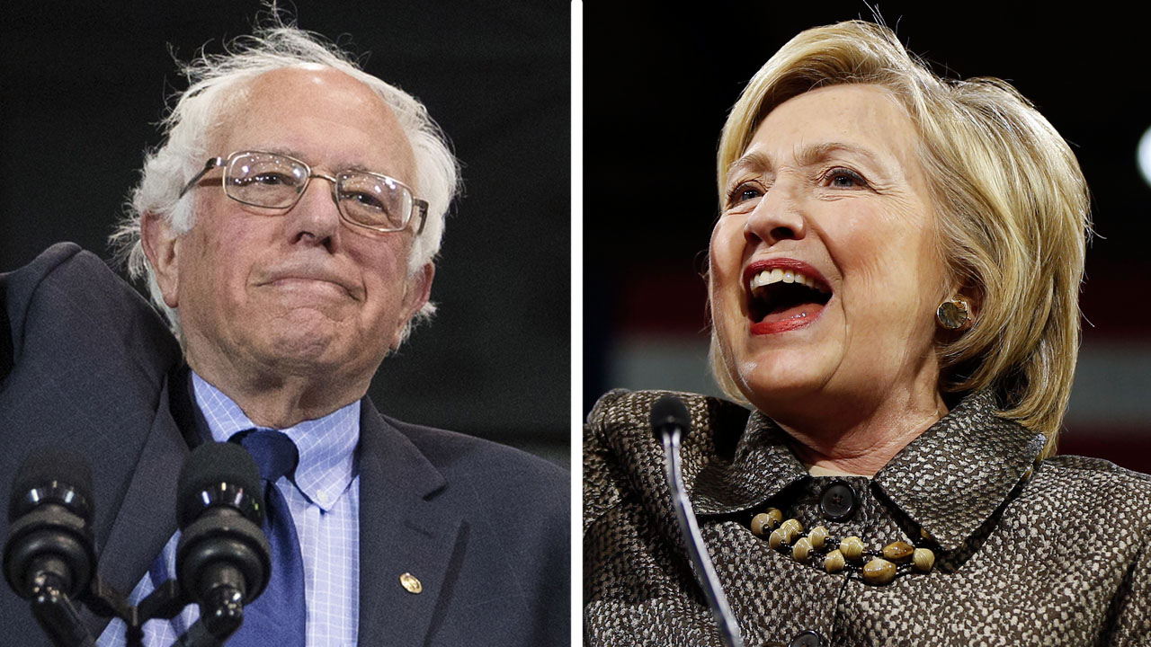 Clinton and Sanders go after big banks on the campaign trail