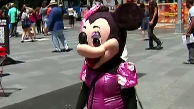 'Minnie Mouse' arrested for harassing family in Times Square