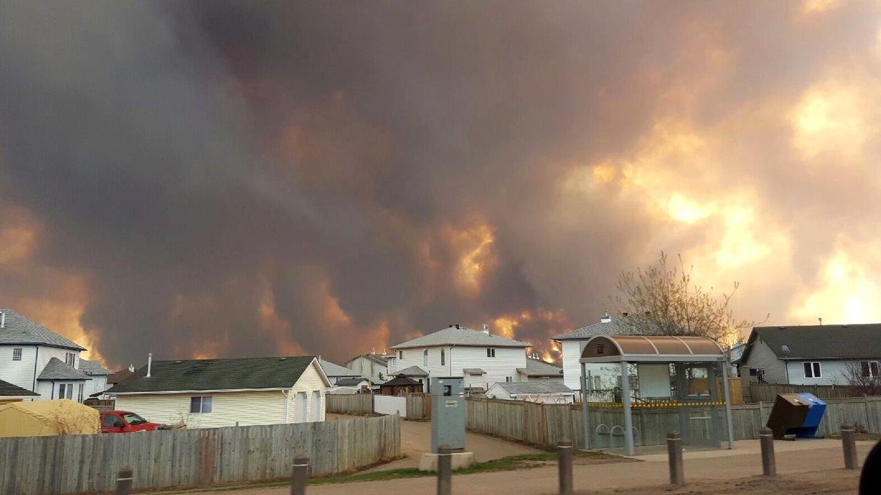 Massive wildfire forces evacuation of entire city in Canada