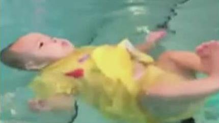 Baby's swim survival lesson draws outrage, praise online