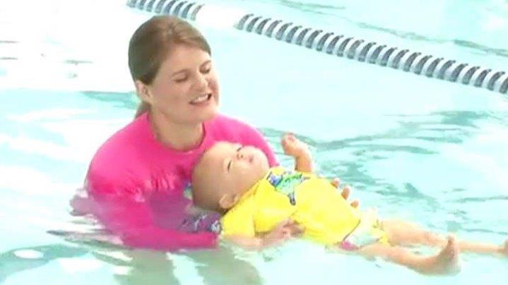 Mother defends letting her baby float in a swimming pool