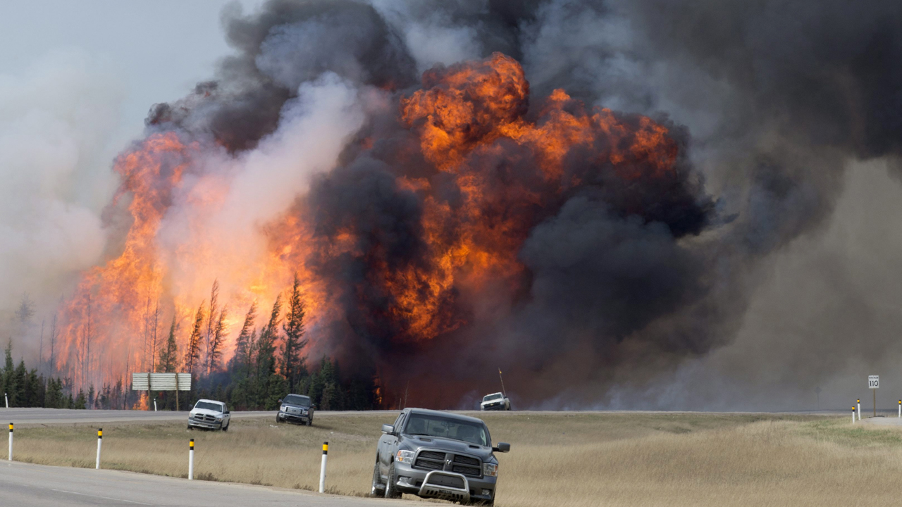 Canada's wildfire explodes in size, could last months