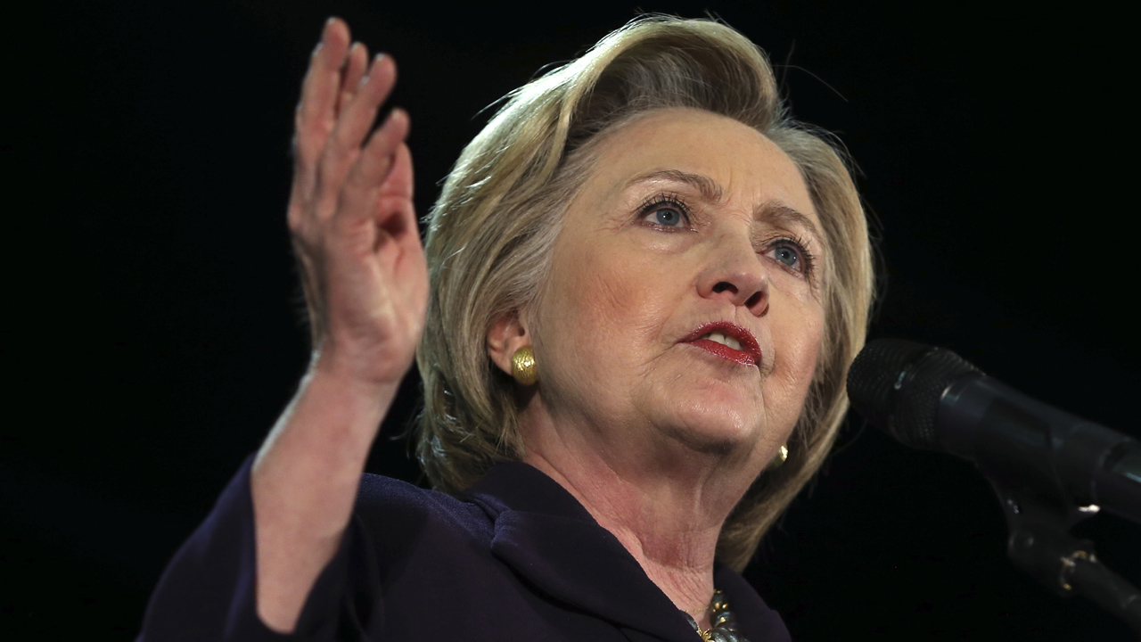 Clinton downplays FBI probe, calls it a 'security inquiry' 