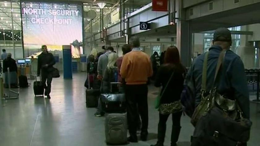 TSA wait times threaten to replace officers with contractors