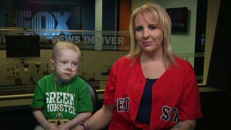 Young fan who had 30 heart procedures meets his MLB hero