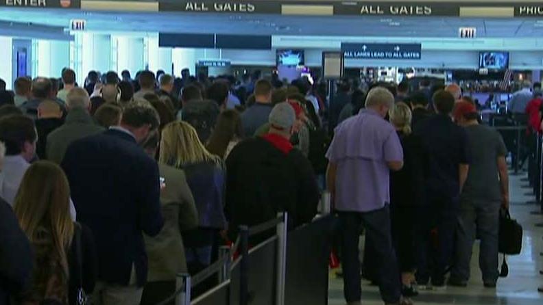 Long airport security lines leave passengers stranded