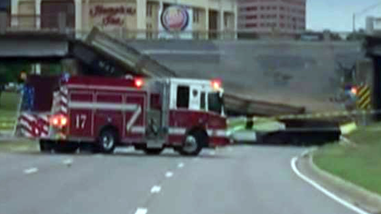 Crews rescue driver after bridge collapses onto his truck