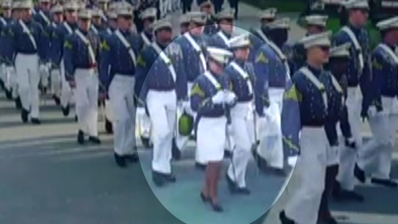 Cadet caught checking phone during graduation march