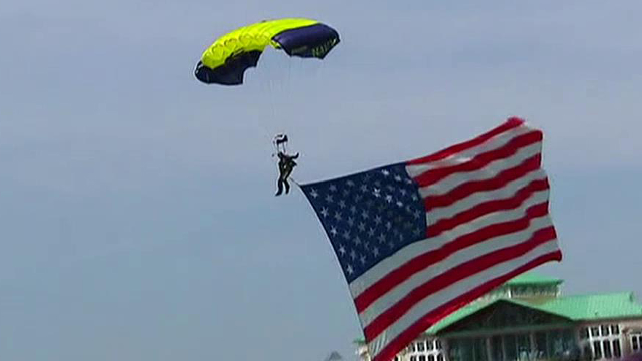 Parachute and dive teams perform during Fleet Week